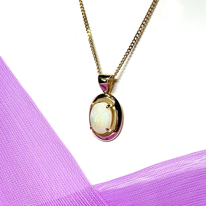 Yellow gold oval real opal necklace pendant