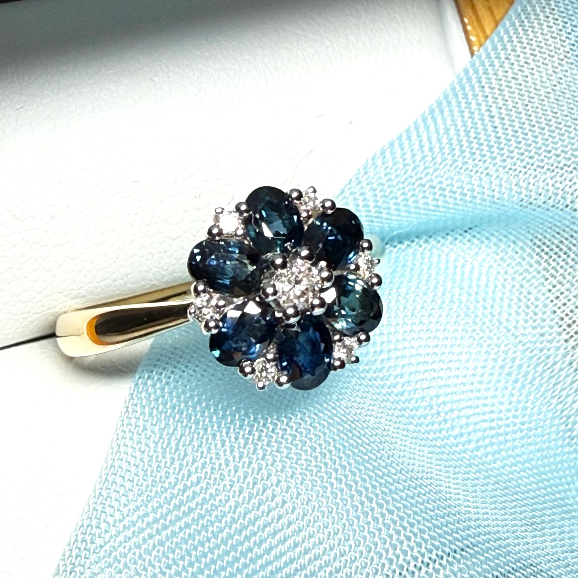 Yellow gold real dark blue sparkling sapphire and diamond round shaped cluster ring