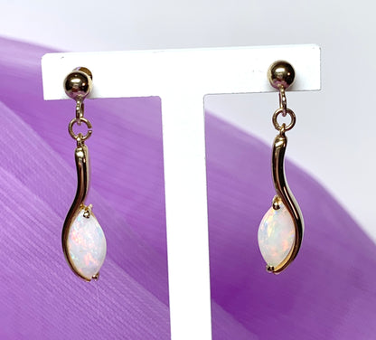 Yellow gold real opal marquise drop earrings