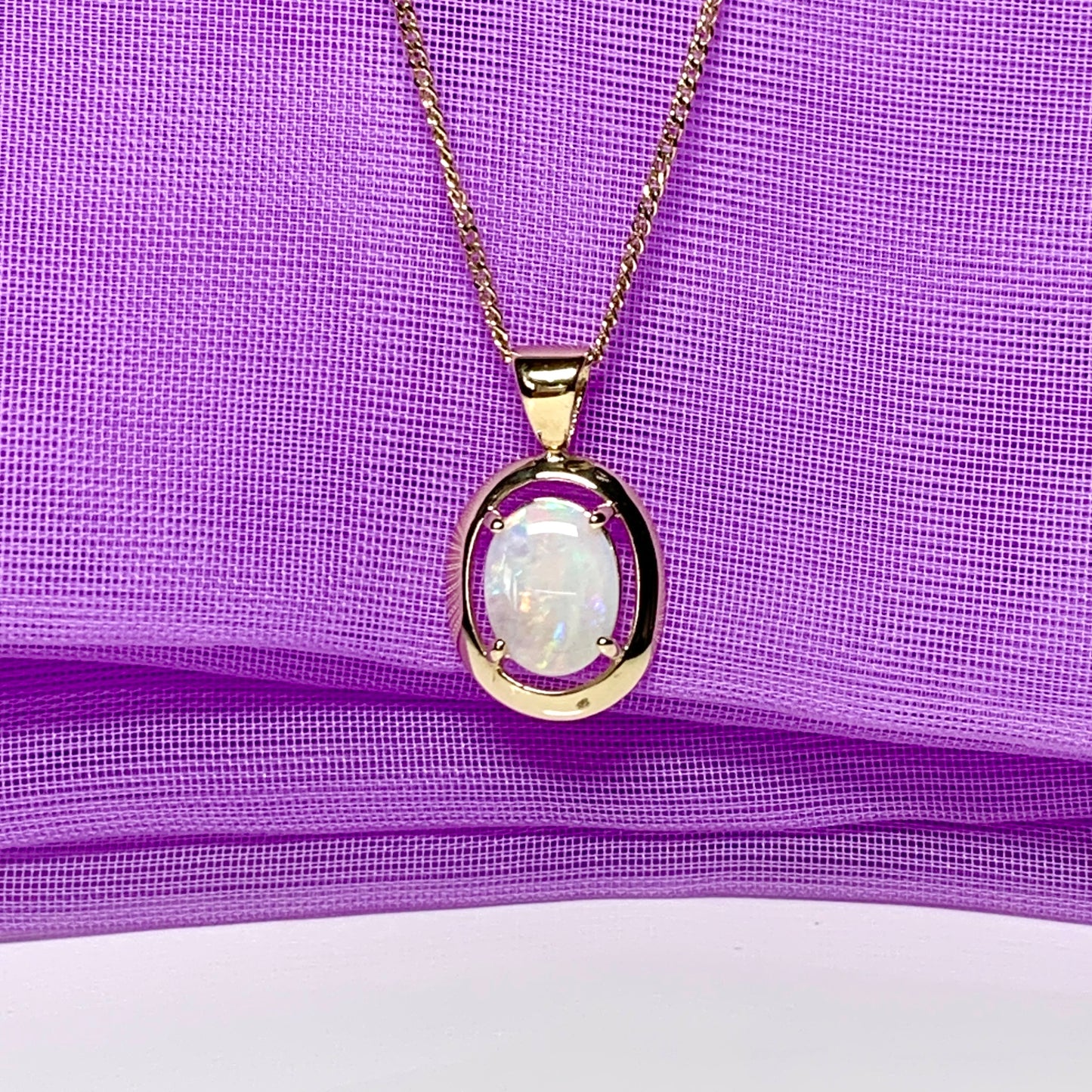 Yellow gold oval real opal necklace pendant