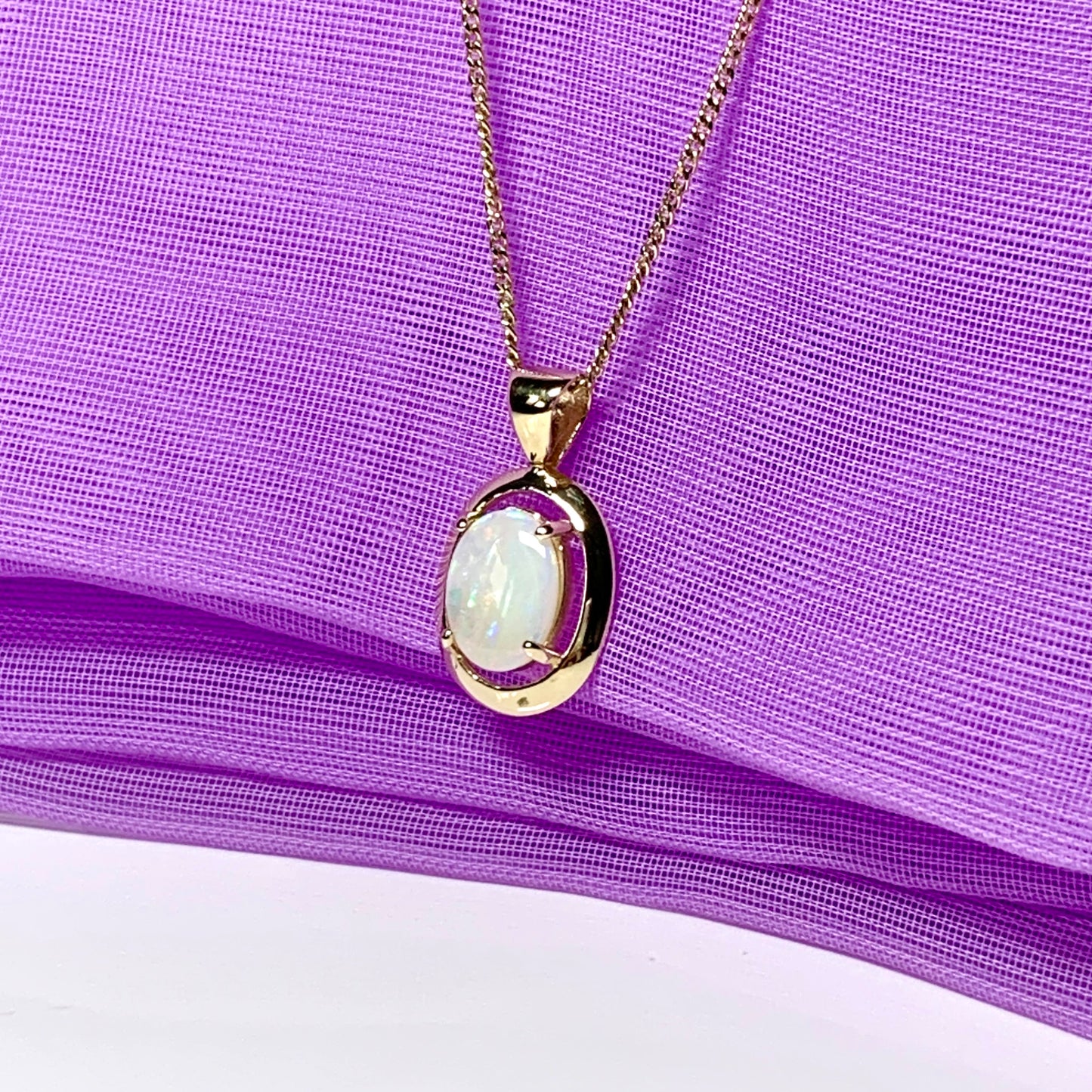 Yellow gold oval real opal necklace pendant