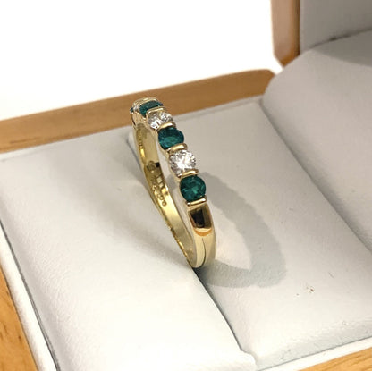 Tension Bar Set Emerald And Diamond Yellow Gold Eternity Ring