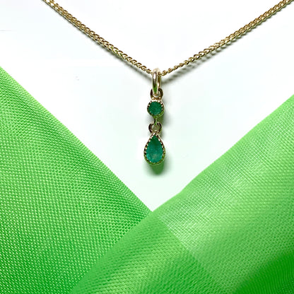 Yellow gold fancy emerald necklace