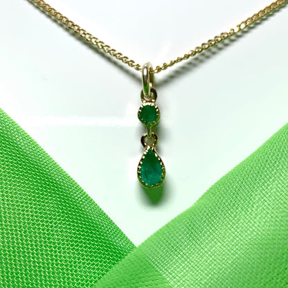 Yellow gold fancy emerald necklace