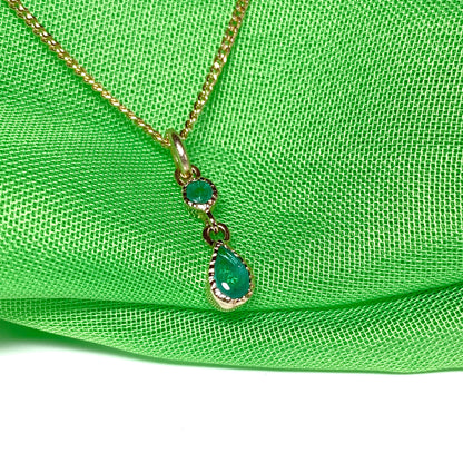 Yellow gold fancy emerald necklace