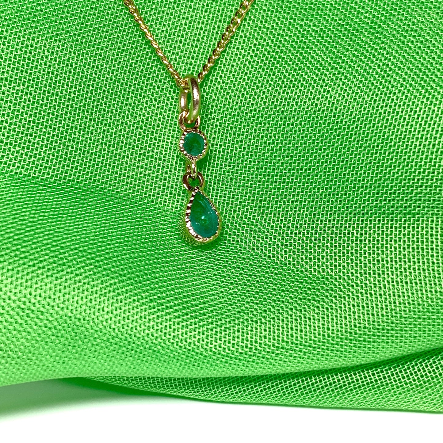 Yellow gold fancy emerald necklace