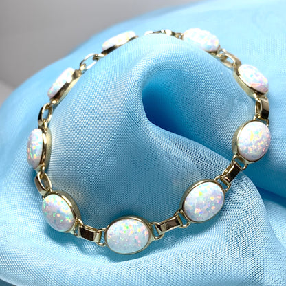 Yellow gold oval opal  bracelet