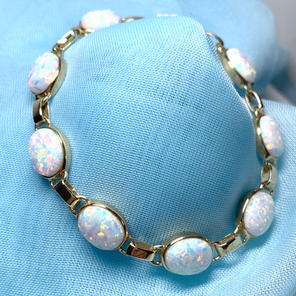 Yellow gold oval opal  bracelet