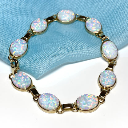 Yellow gold oval opal  bracelet