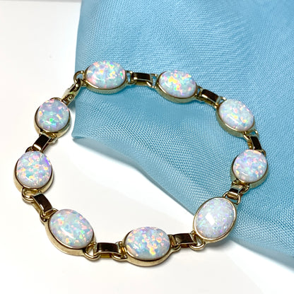 Yellow gold oval opal  bracelet