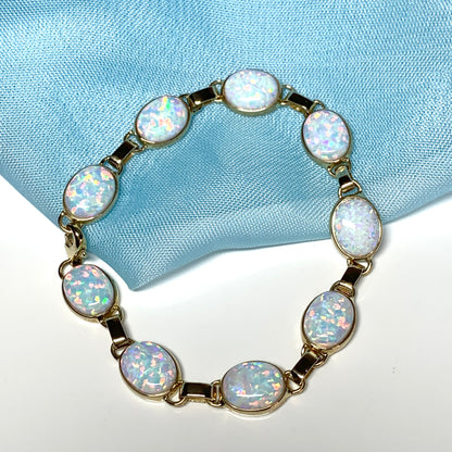 Yellow gold oval opal  bracelet