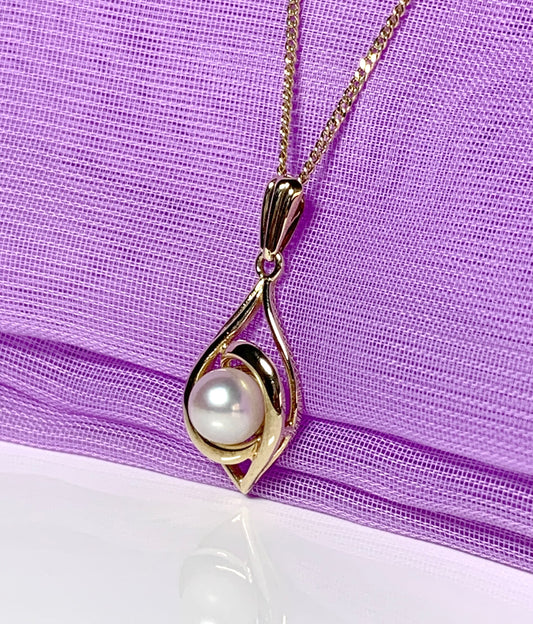 Yellow gold oval cultured pearl necklace fancy swirl