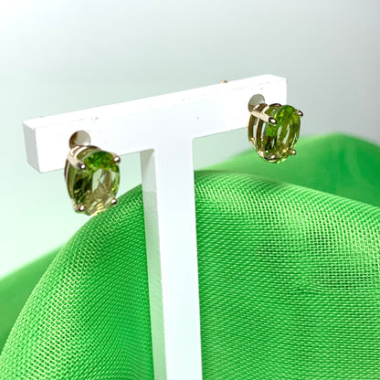 Yellow gold peridot oval stud earrings