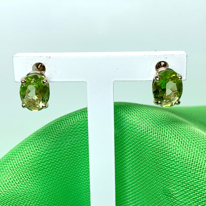 Yellow gold peridot oval stud earrings