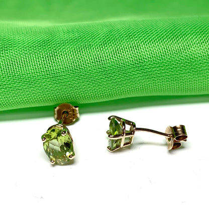 Yellow gold peridot oval stud earrings