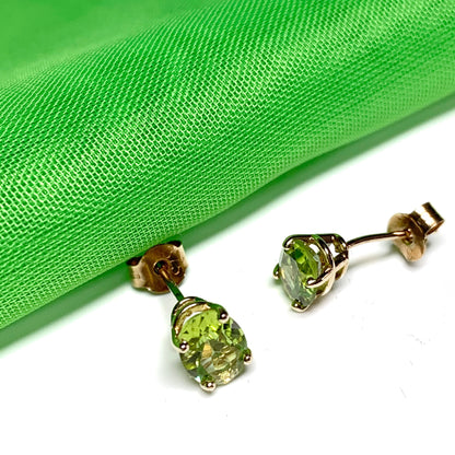 Yellow gold peridot oval stud earrings