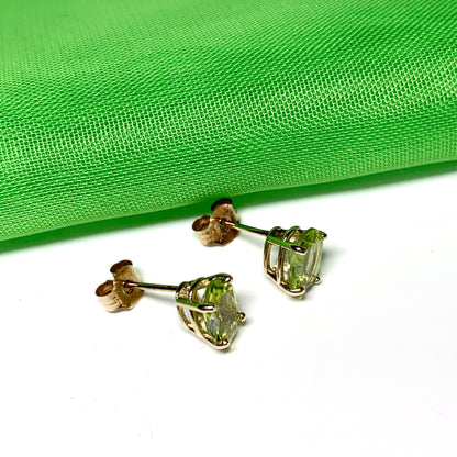 Yellow gold peridot oval stud earrings