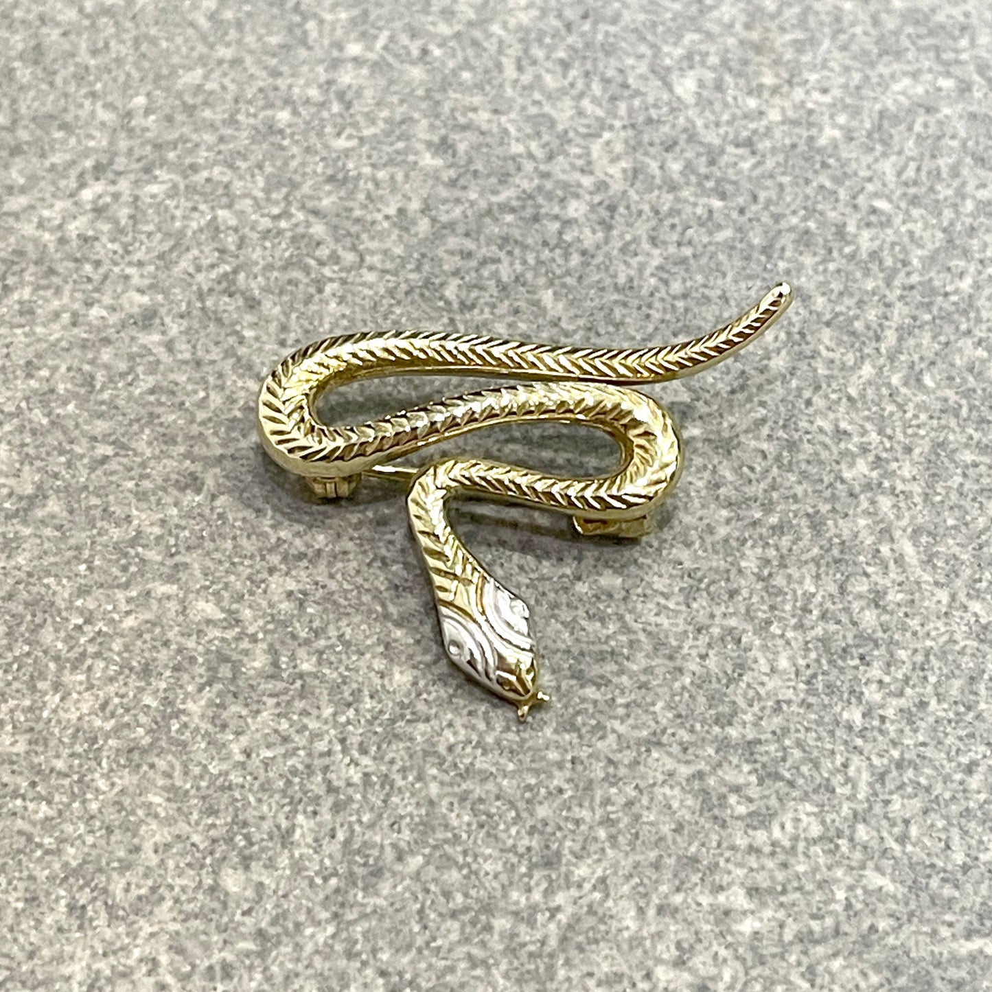 Yellow gold snake brooch