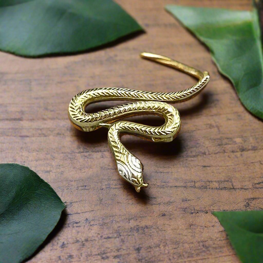 Yellow gold snake brooch