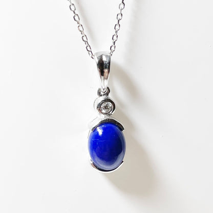 Blue lapis lazuli and diamond oval white gold necklace