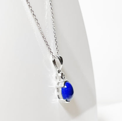 Blue lapis lazuli and diamond oval white gold necklace