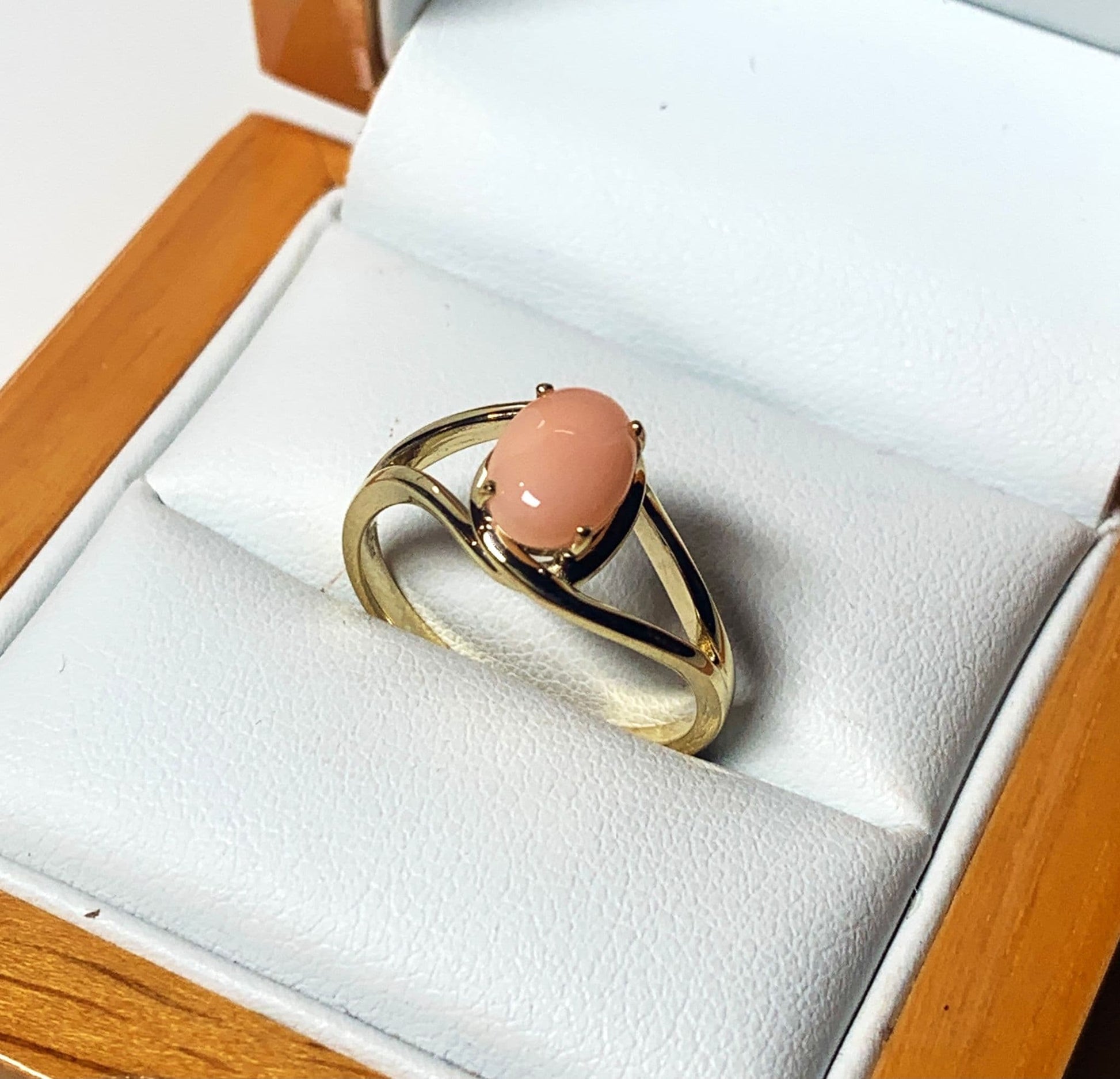 Coral yellow gold oval open dress ring
