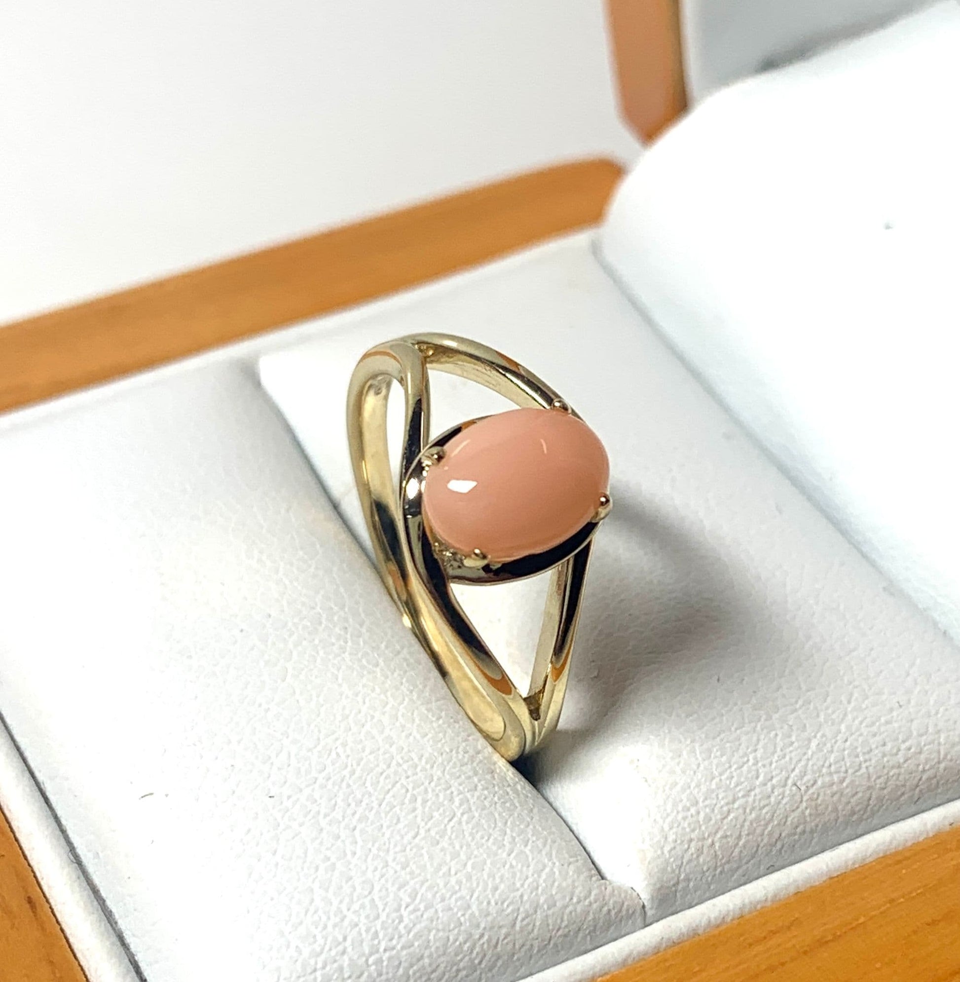 Coral yellow gold oval open dress ring