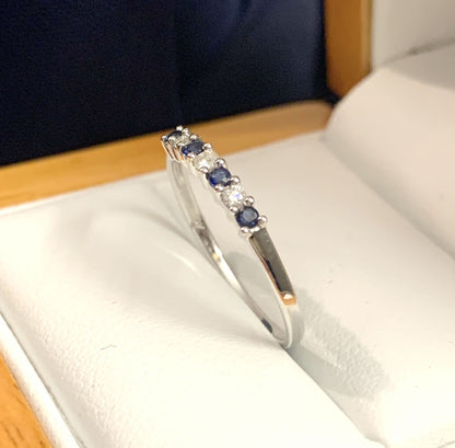 White Gold Blue Sapphire And Diamond Claw Set Eternity Ring