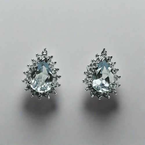 Large pear shaped blue topaz and diamond sterling silver cluster stud earrings