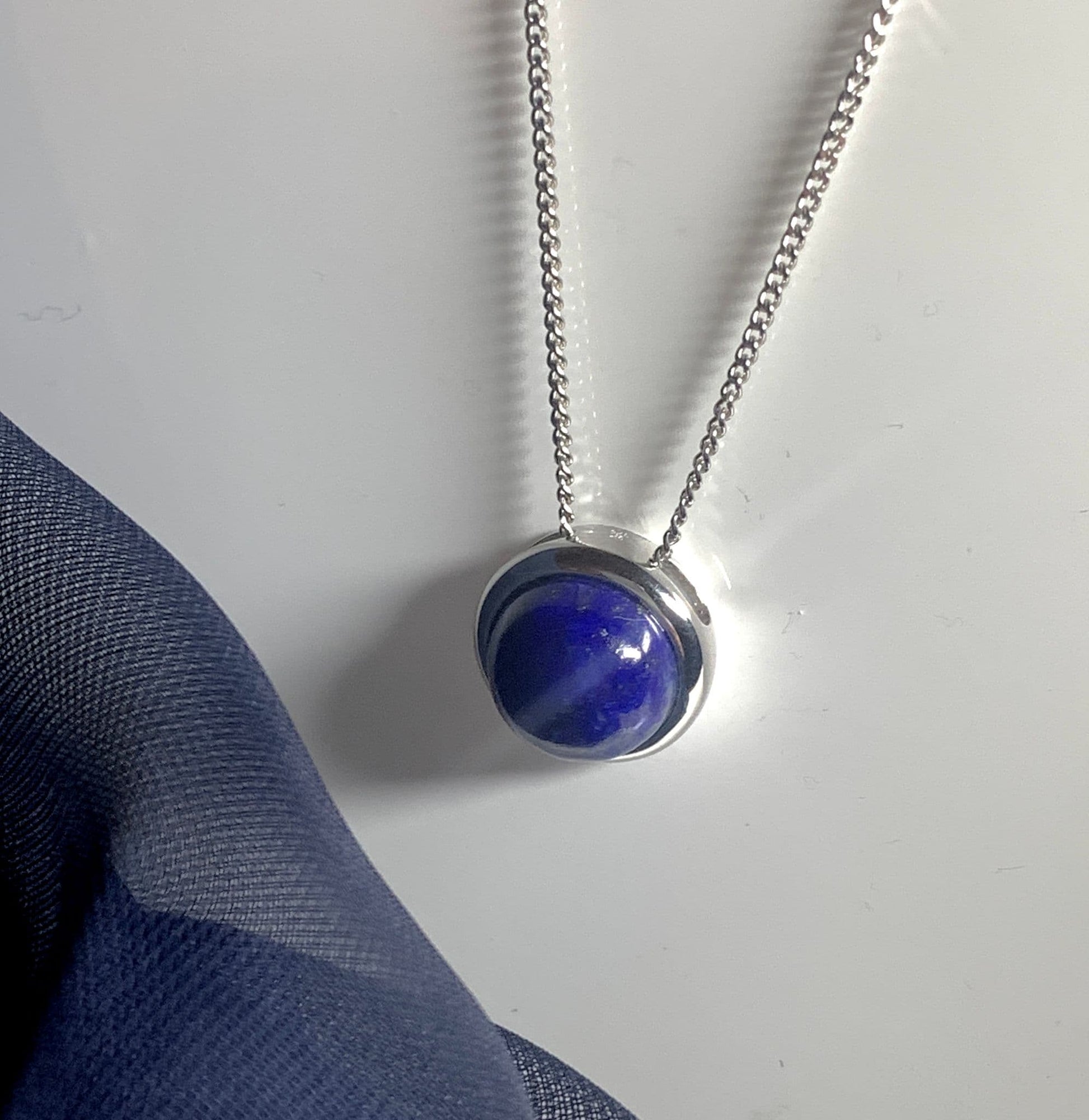 Large round blue lapis lazuli white gold necklace pendant