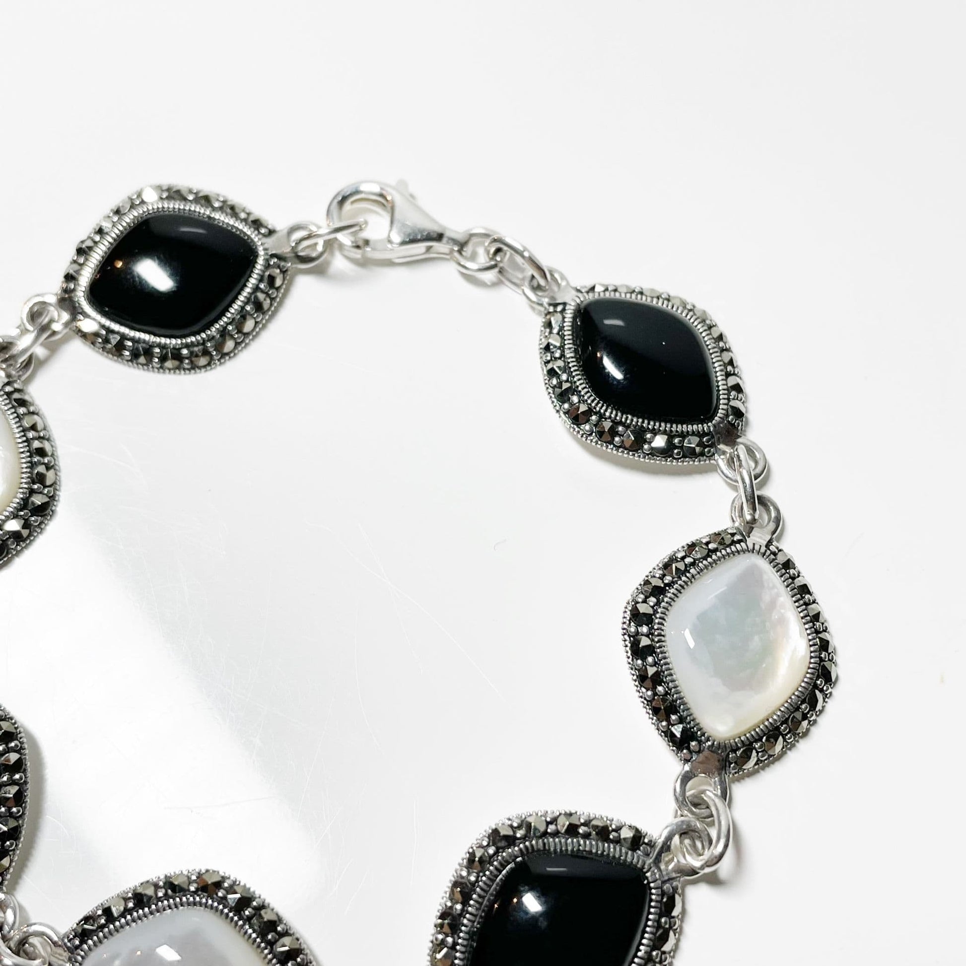 Mother of pearl marcasite and onyx sterling silver three row ladies bracelet