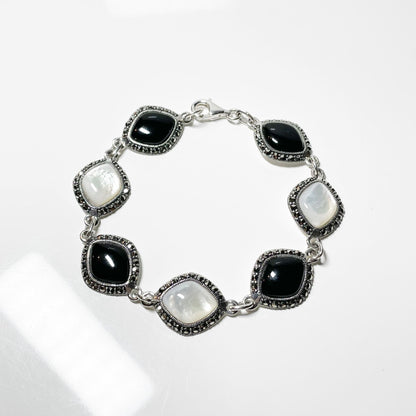 Mother of pearl marcasite and onyx sterling silver three row ladies bracelet