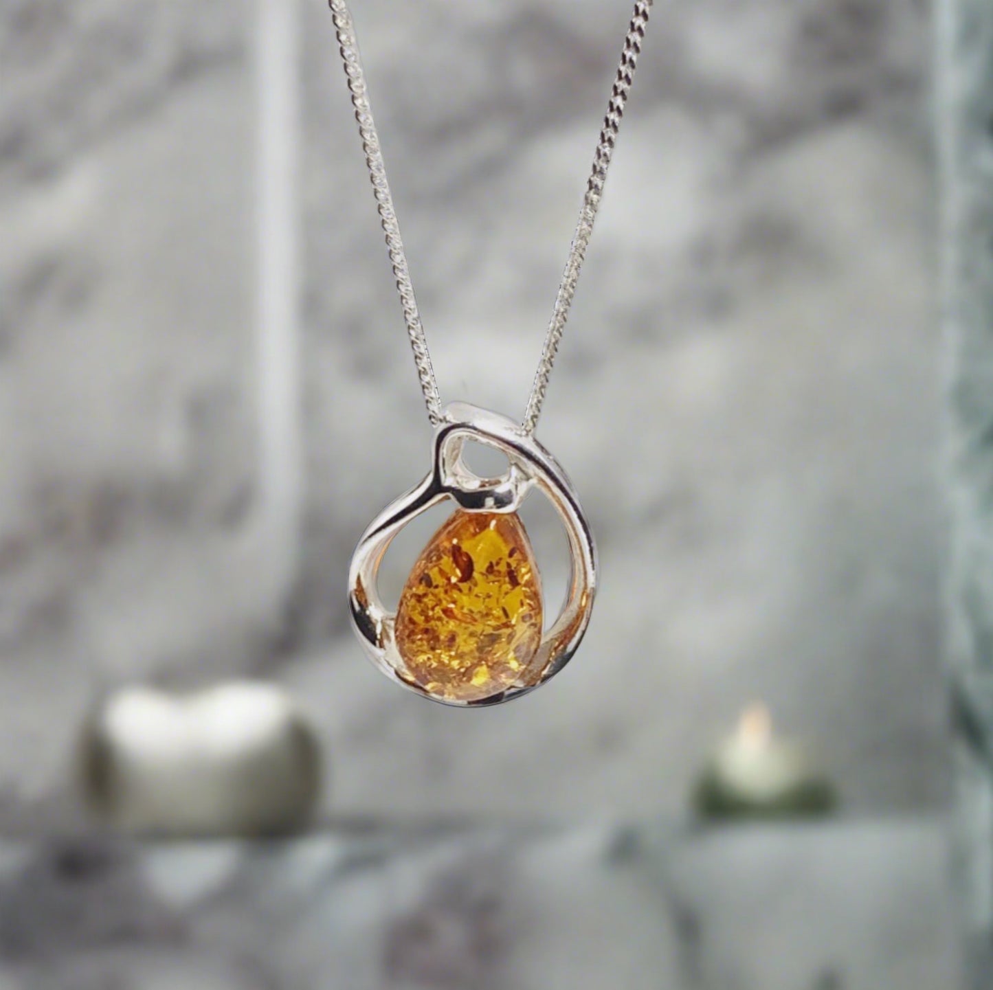 Orange amber fancy tear drop sterling silver necklace