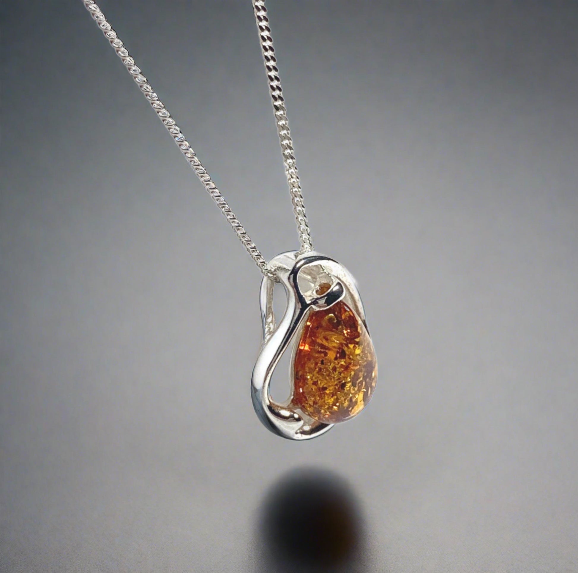 Orange amber fancy tear drop sterling silver necklace