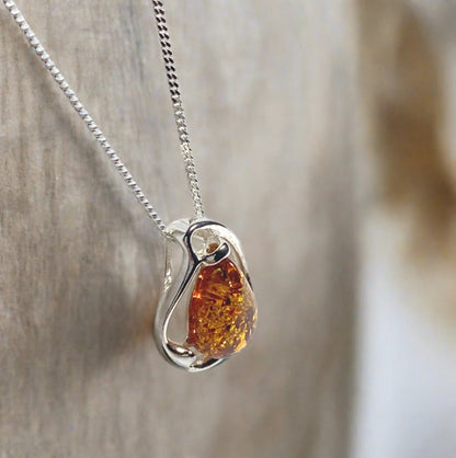 Orange amber fancy tear drop sterling silver necklace