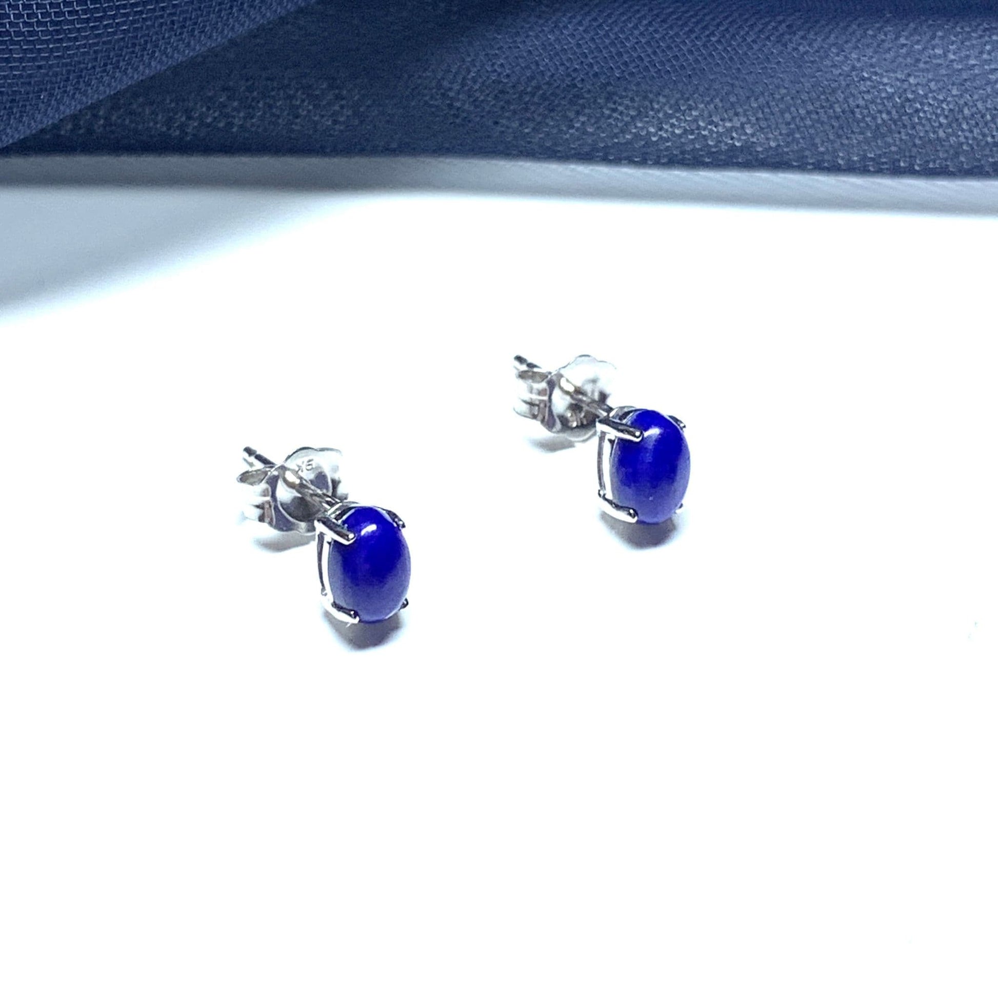 Oval blue lapis lazuli white gold earrings