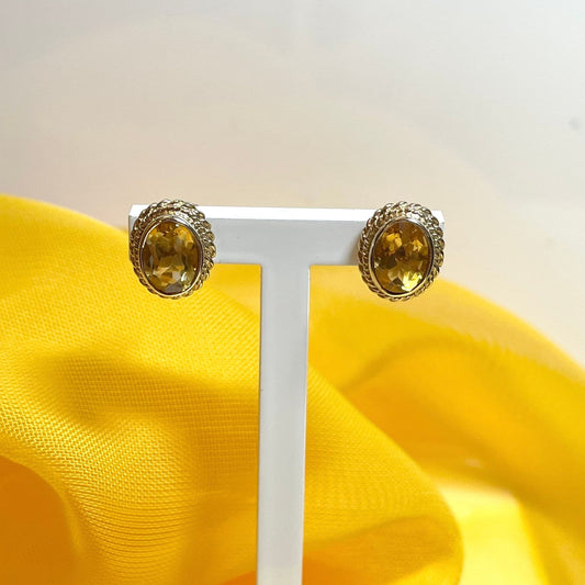 Oval citrine yellow gold stud earrings