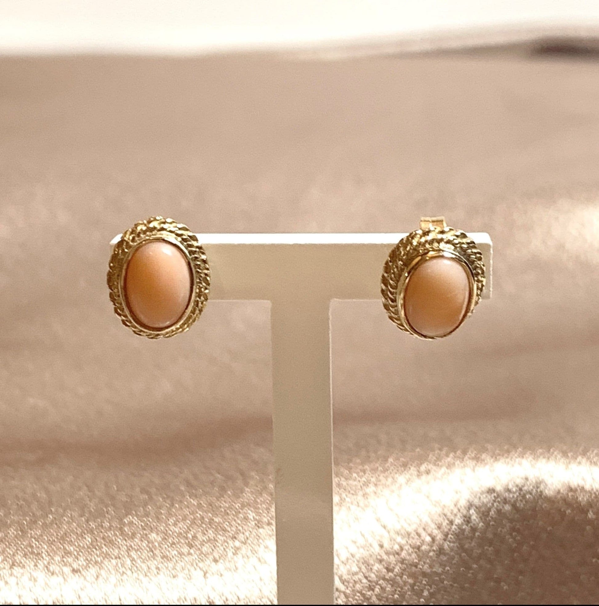Oval coral yellow gold stud earrings