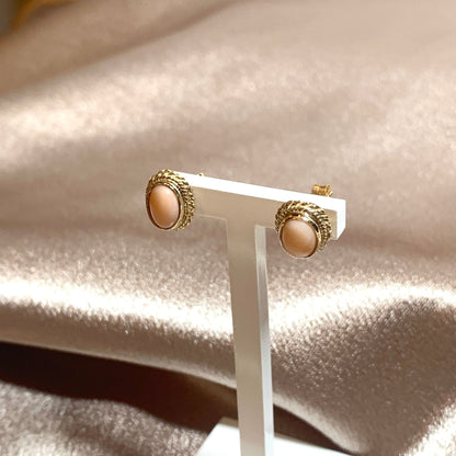 Oval coral yellow gold stud earrings