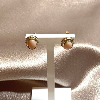 Oval coral yellow gold stud earrings