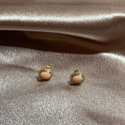 Oval coral yellow gold stud earrings