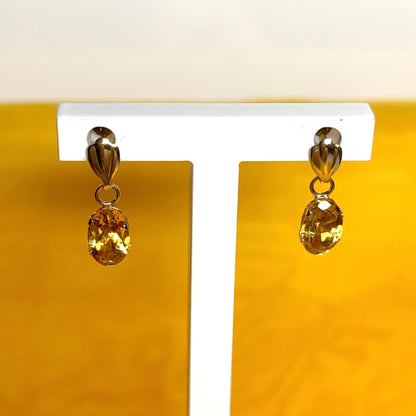 Oval shaped citrine yellow gold earrings