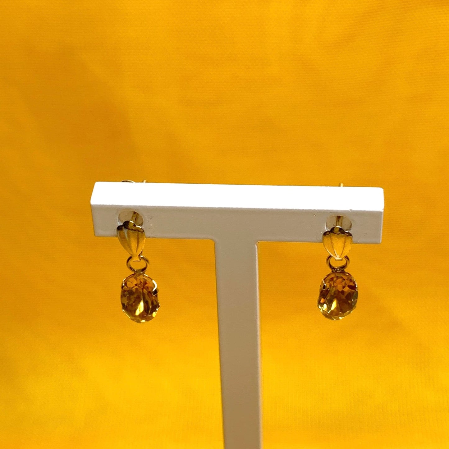 Oval shaped citrine yellow gold earrings