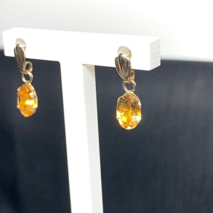 Oval shaped citrine yellow gold earrings