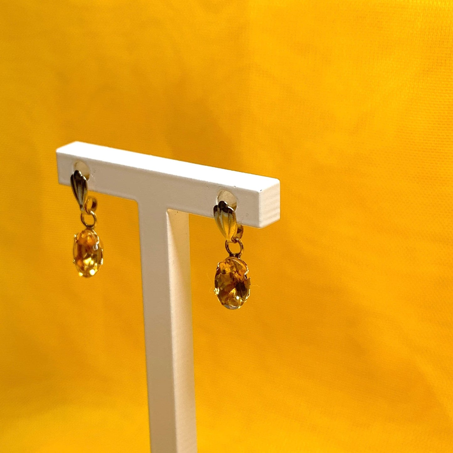 Oval shaped citrine yellow gold earrings