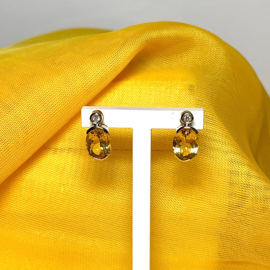Oval yellow citrine and diamond gold stud earrings