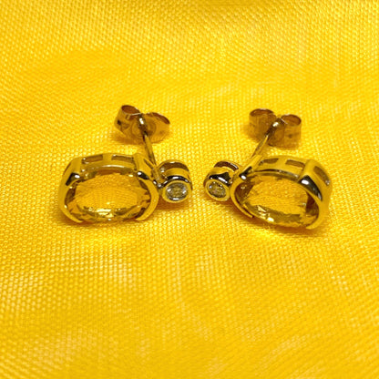 Oval yellow citrine and diamond gold stud earrings