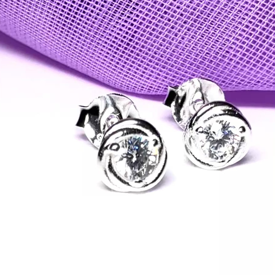 Sterling Silver Round Twisted Edge Cubic Zirconia Stud Earrings