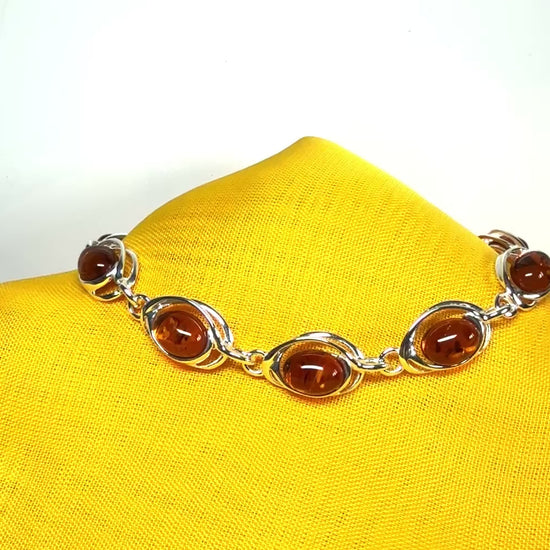 Real amber bracelet oval pierced fancy design