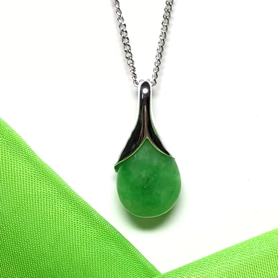 Real green jade tear drop dotted sterling silver pear shaped pendant including a solid chain